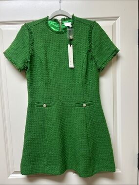 Pinch emerald green special occasion dress. Fully lined. Rhinestone buttons.